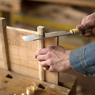 Carpenter Cutting Wood