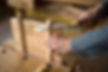 Carpenter Cutting Wood 
