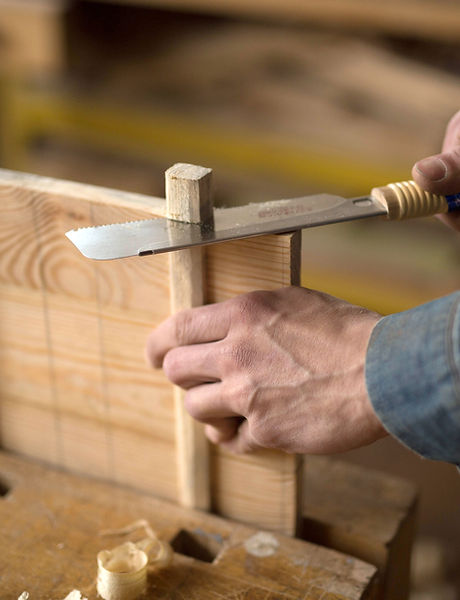 Carpenter Cutting Wood 