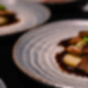 Michelin star plated dinner more professional dark and moody fancy .jpg