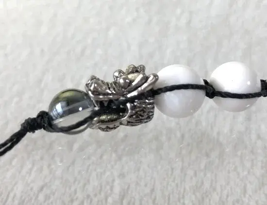 サムネイル： 銀龍ホワイトシェルの昇龍ストラップ　RN024