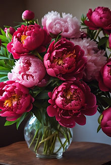 vase full of red peonies.jpg