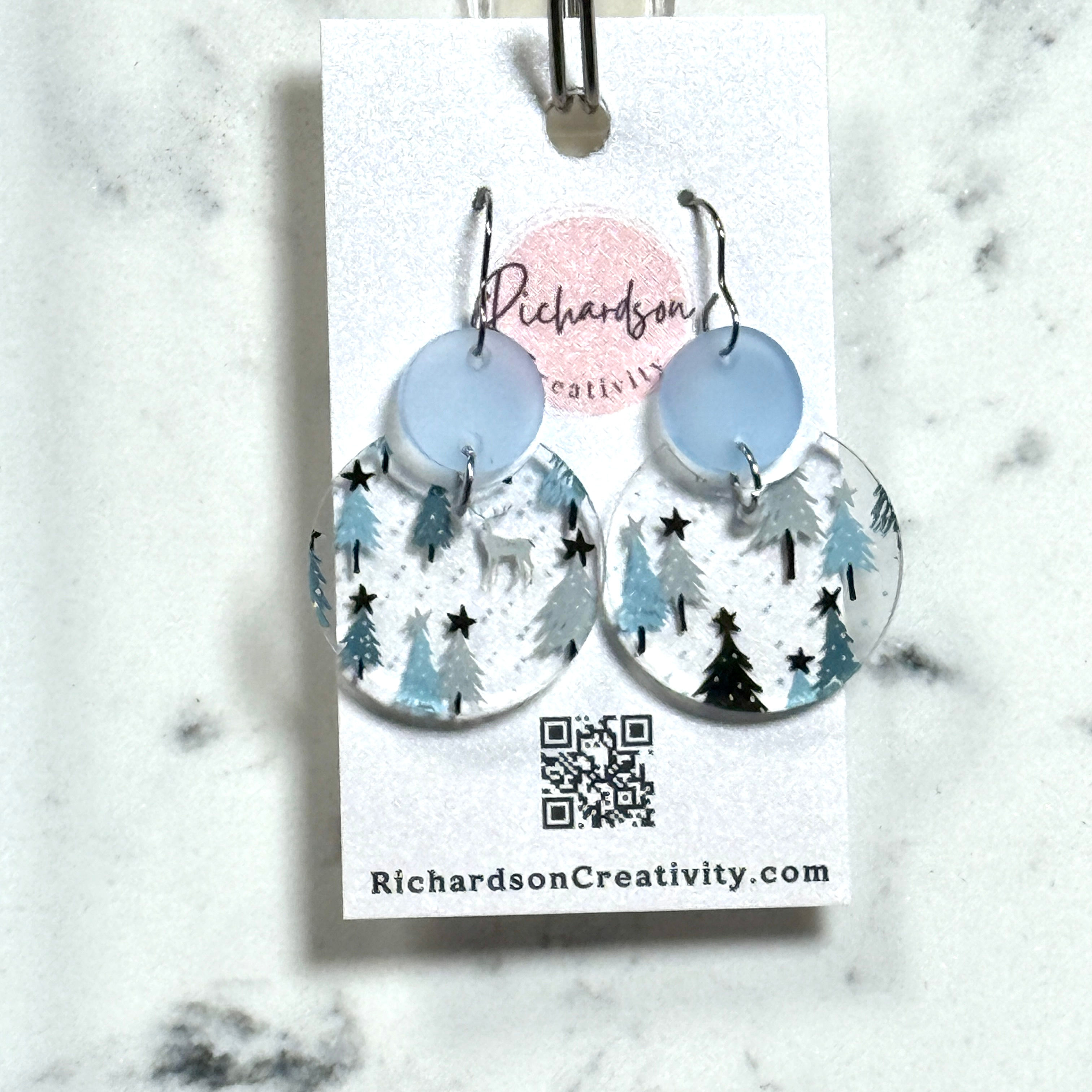 clear blue tree pattern and blue circles acrylic earrings