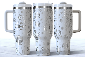Snowflakes engraved on a white stainless steel 40oz tumbler with a handle.