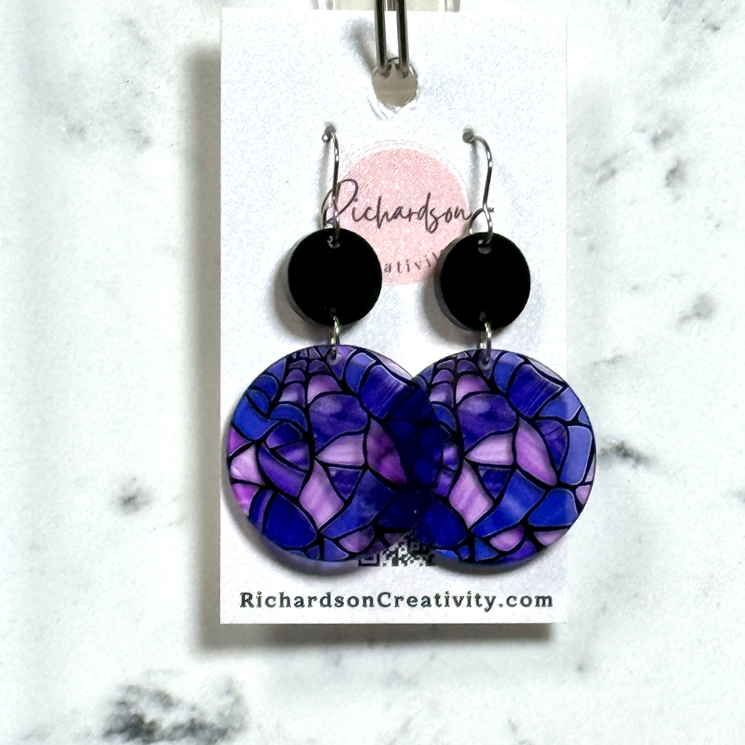 purple stained glass pattern with spider acrylic earrings