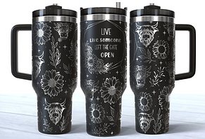 Highland cows and sunflowers with phrase "Live life like someone left the barn door open" engraved on a black 40oz stainless steel tumbler with a handle.
