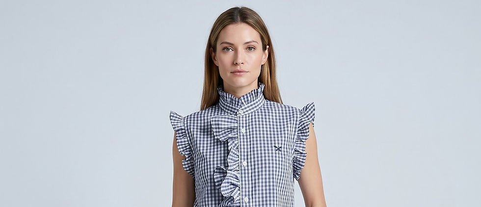 Female model wearing a blue and white checked frilled blouse reworked from a cotton men's shirt