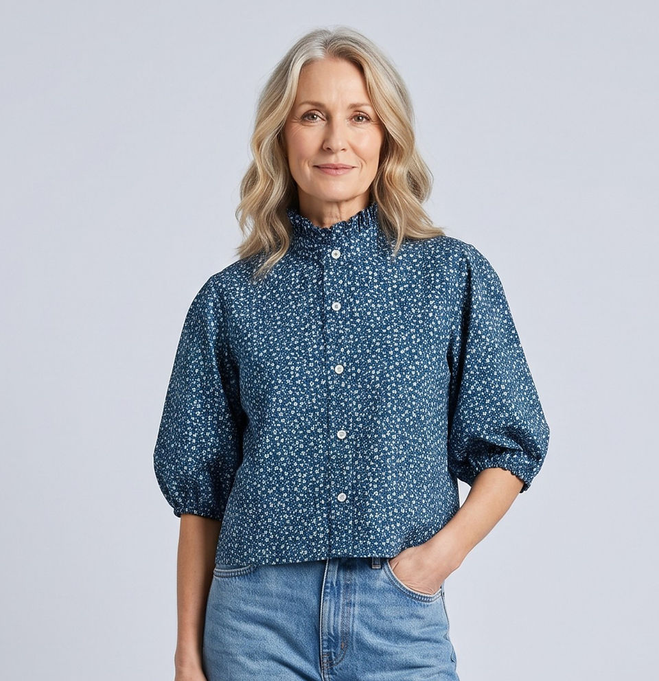 Woman wearing a blue Loved Shirt Rework design