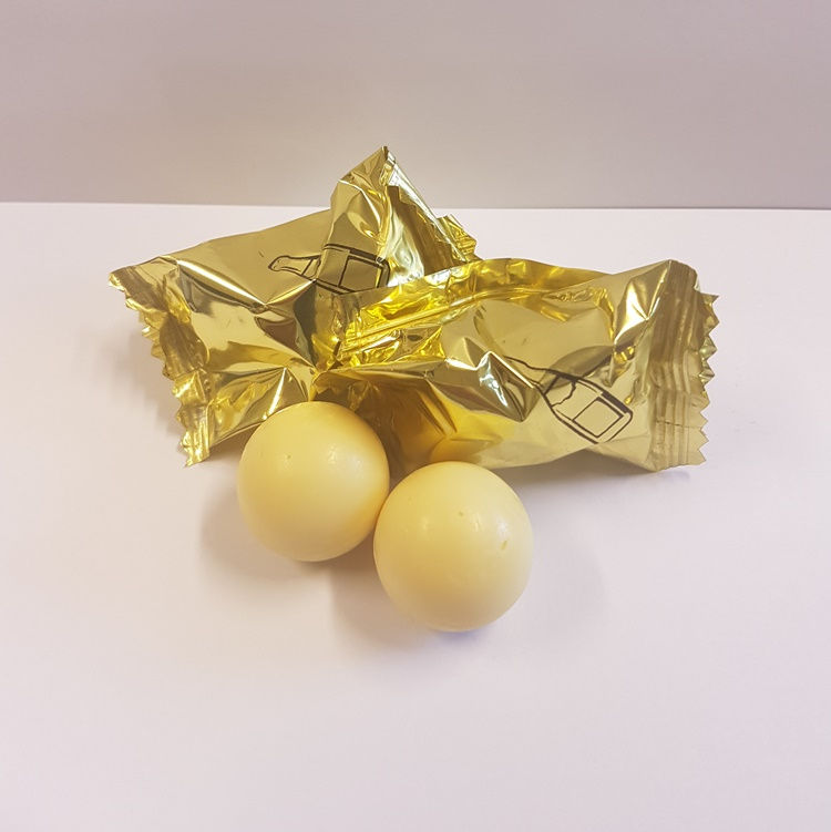 Thumbnail: Champagne Truffles wrapped and unwrapped