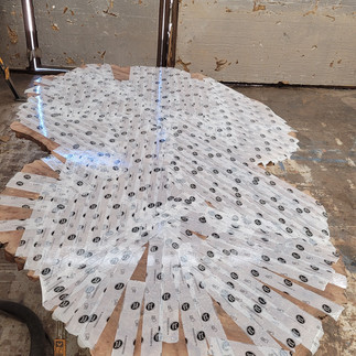 tuck tape covering underside of cracks to seal resin pour