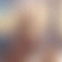 A working professional enjoying a cup of coffee and watching reels during office break