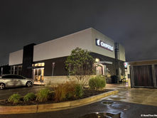 Outside a Chipotle restaurant at night