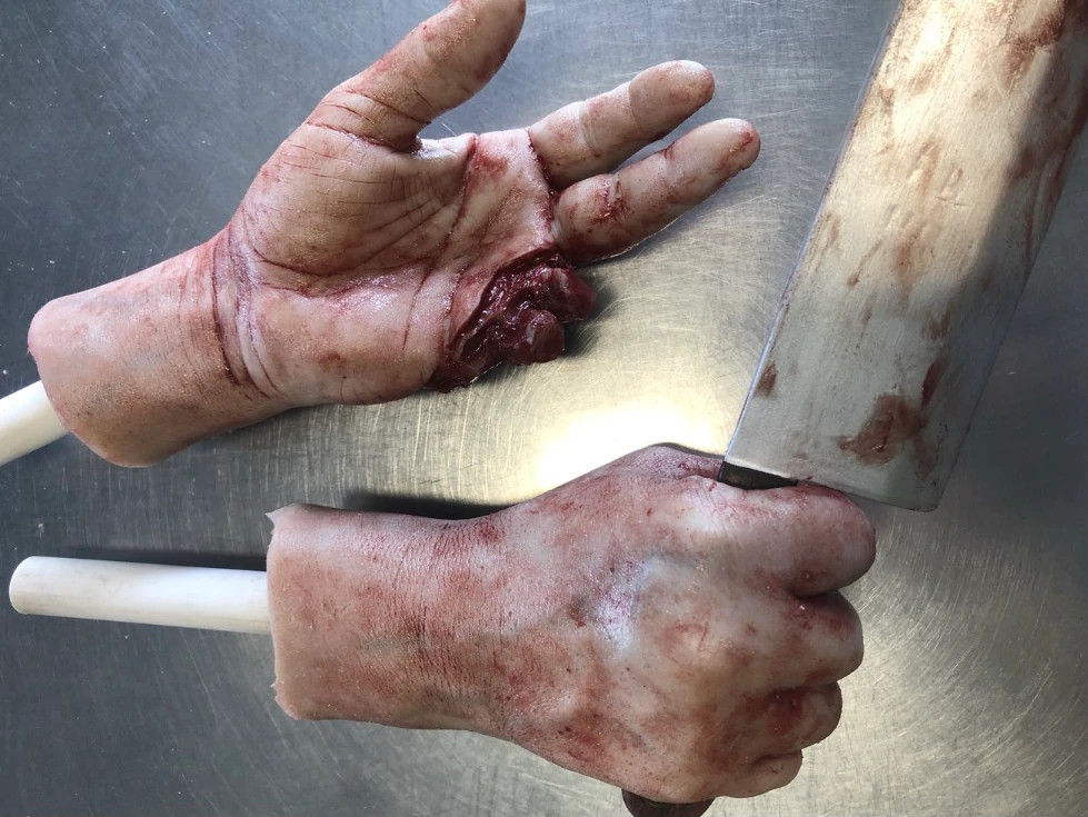Thumbnail: Pair of Hands With Knife
