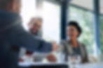 Meeting, partnership and business people shaking hands in the office for a deal, collabora