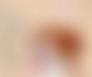 Happy brown and white dog with tongue out next to the phrase ‘Cue Smarter, Not Louder’ on a wooden background with dog bone and paw print graphics — promoting positive dog training techniques