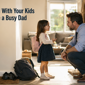 A busy dad crouched by the front door after work, listening closely to his young child