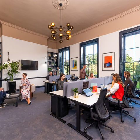 colleagues working in an office together