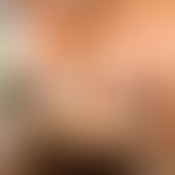 Four colleagues having a productive meeting in an office