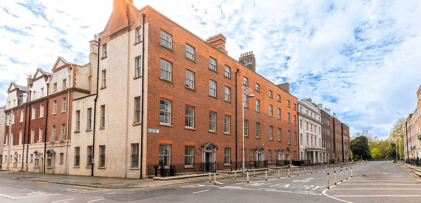 Exterior view showcasing 3 large Georgian buildings