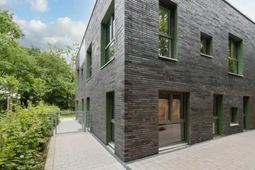 Exterior view of a modern structure finished with Castle Rock architectural thin brick