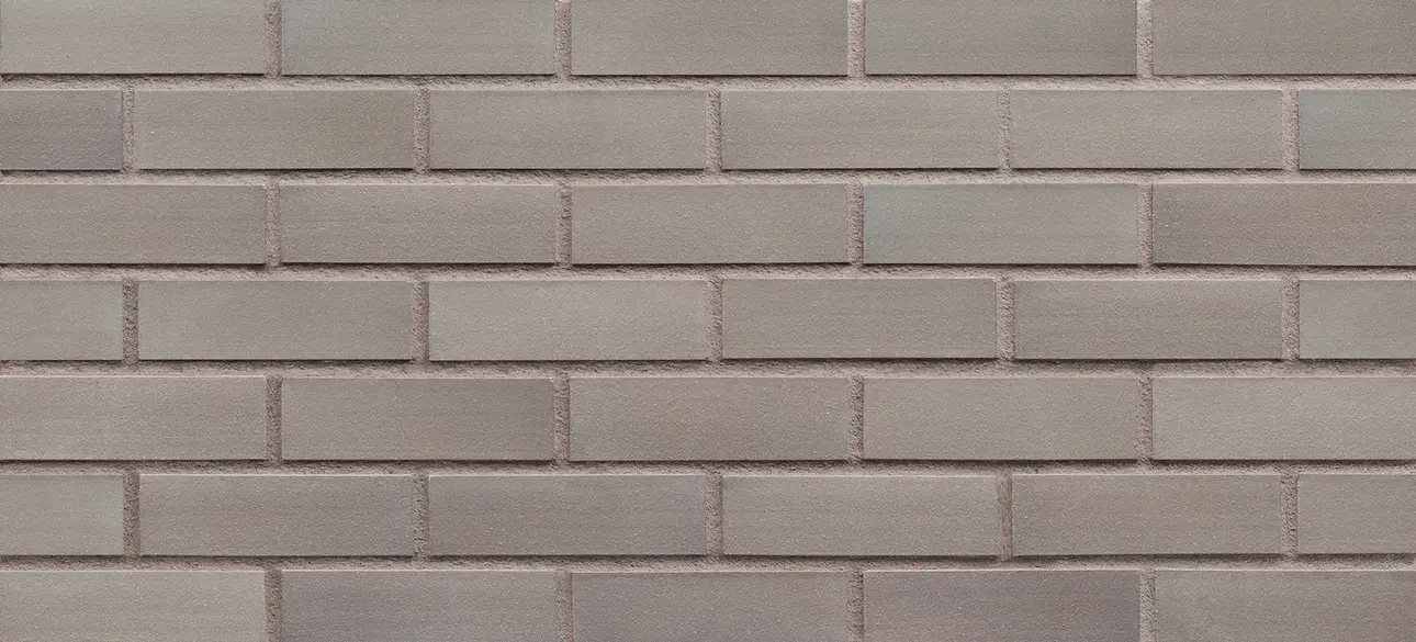 Ice Power modular thin brick veneer with light gray bricks and subtle tonal variation