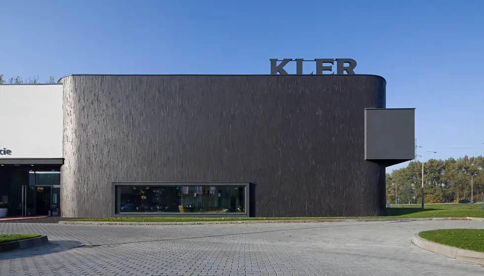 Front view of the Kier building in Poland, featuring a dark Black Beauty Imperial thin brick facade and wide horizontal window