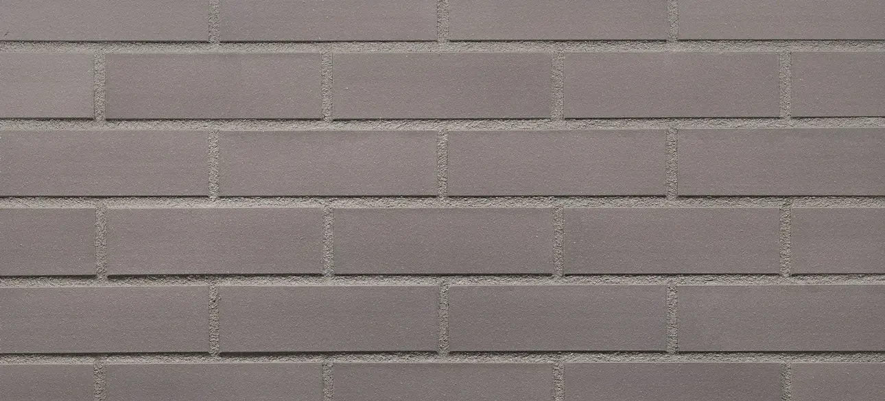 Ice Power King thin brick veneer with light gray bricks and subtle tonal variation