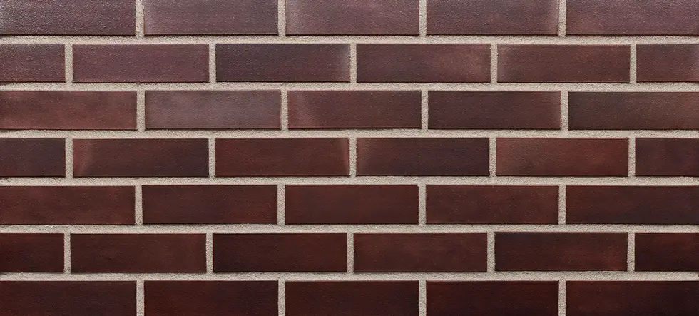 King Crimson Modular Size thin brick veneer with deep red bricks and a smooth matte finish