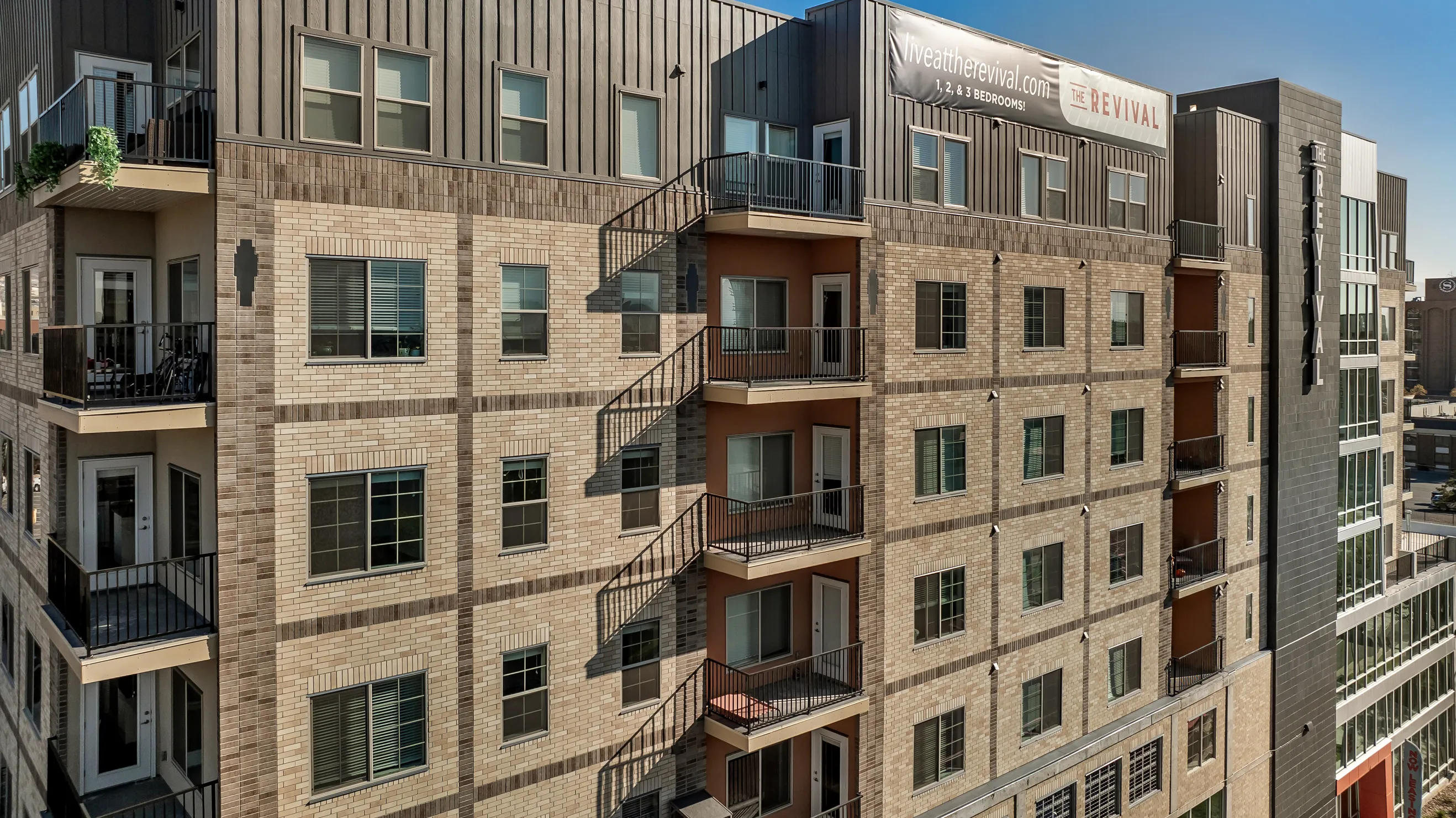 Light and dark brick work together to define the building façade.
