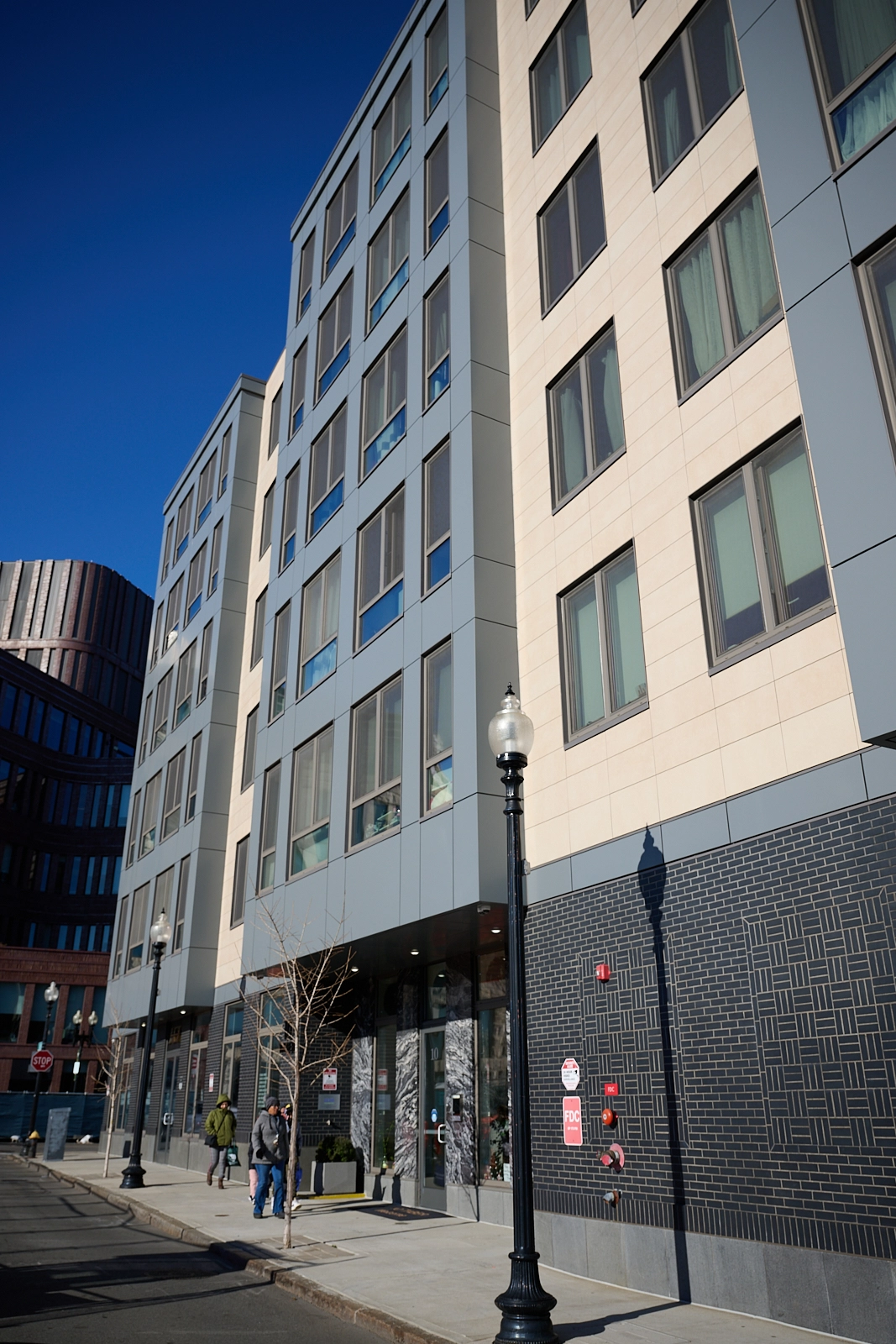 Manganese thin brick elevates this modern multifamily façade.