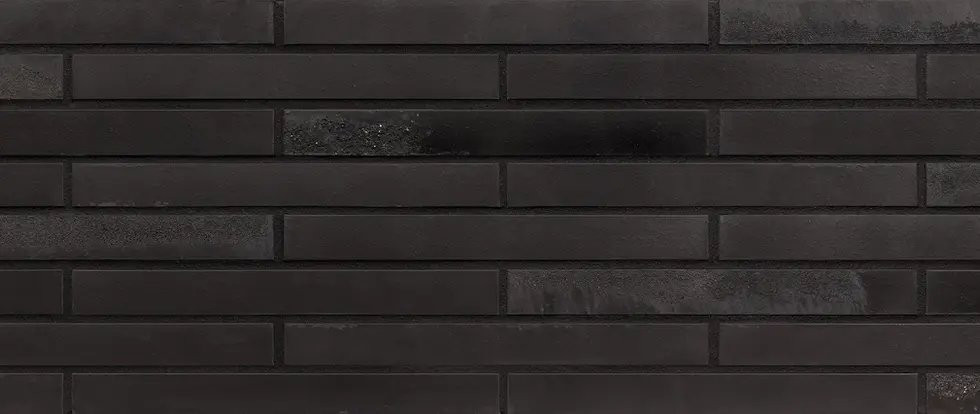 Black Beauty American Imperial thin brick veneer with deep black bricks and subtle surface variation in a horizontal running bond