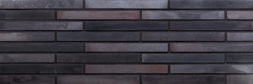 Obsidian Shadow Euro Imperial thin brick veneer with charcoal and slate gray bricks and subtle tonal variation in a horizontal running bond