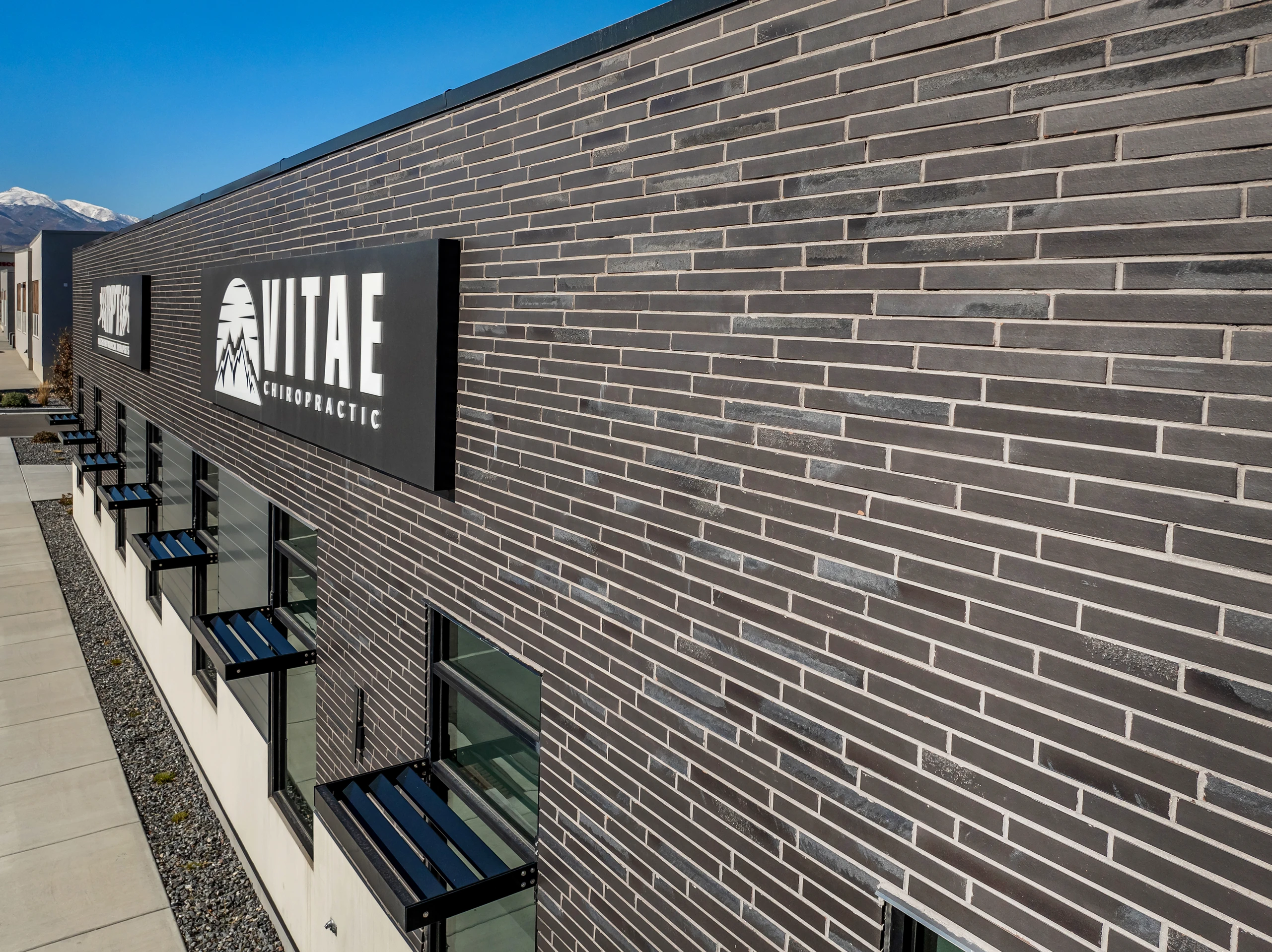 Black Beauty thin brick adds texture and contrast to this healthcare façade.