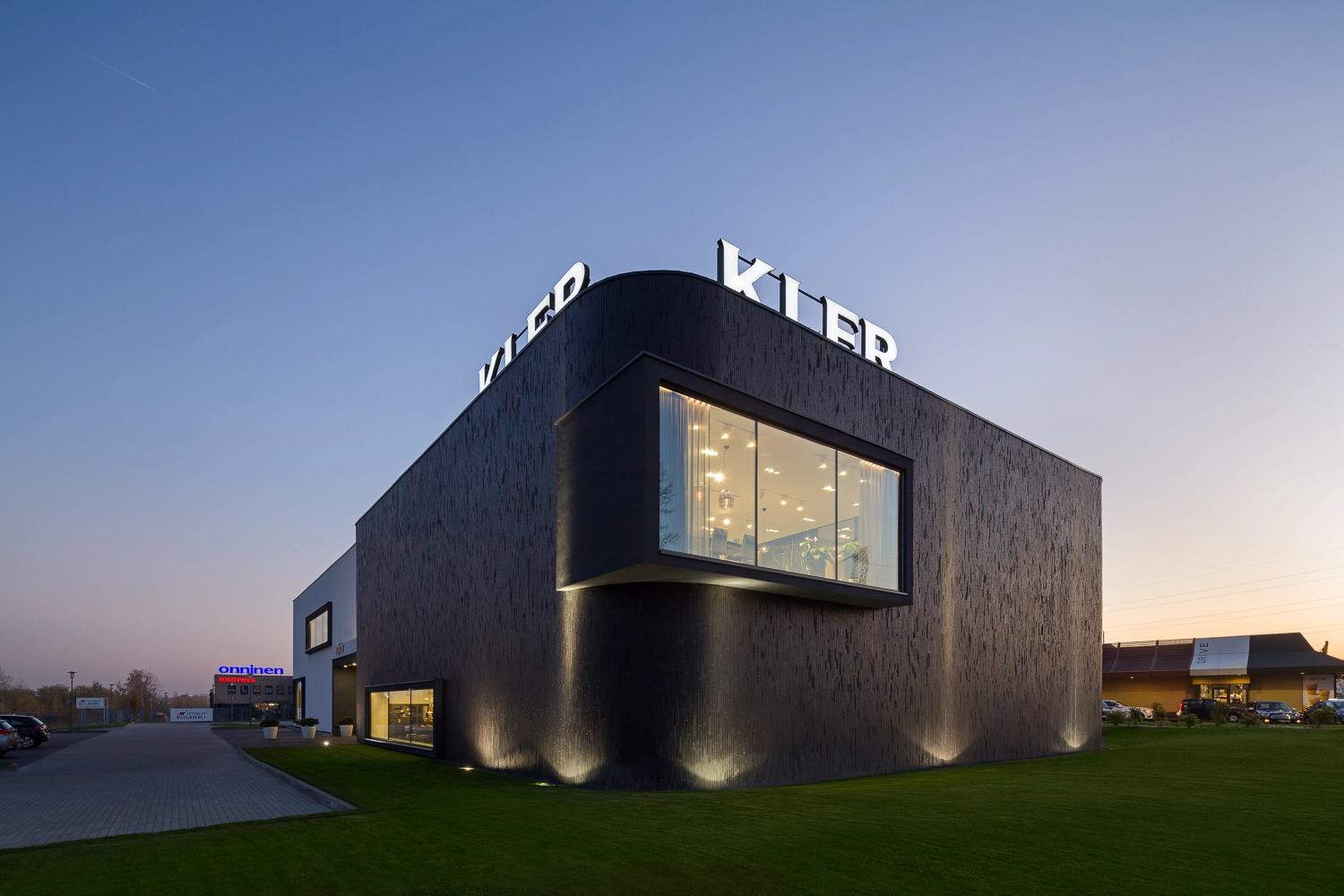 Black Beauty thin brick creates a sleek, monolithic commercial façade.