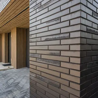 Imperial-size brick strengthens the home's horizontal design.