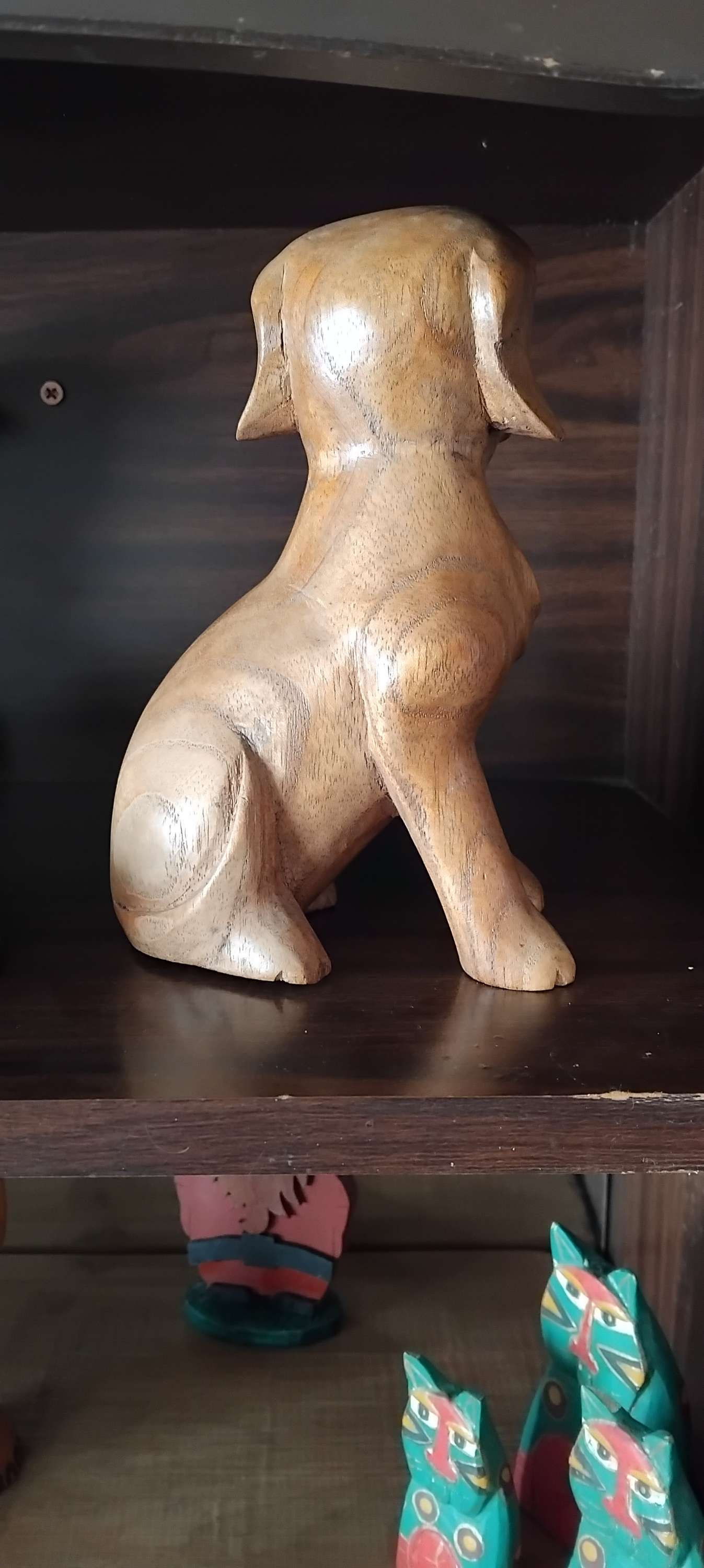 Small wood carved dog