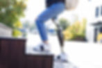 Woman walking on stairs with prosthetic leg