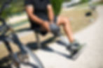 man with prosthetic leg on bike trail