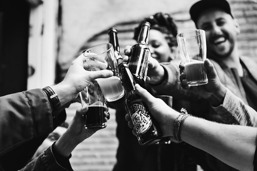people-making-toast-with-beers.jpg
