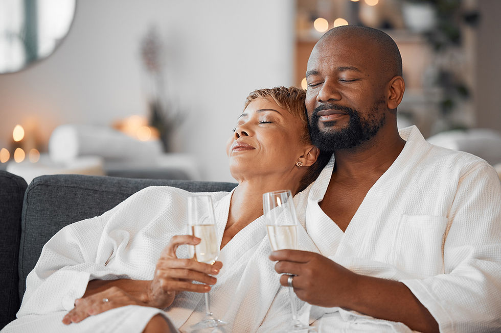 A couple enjoying their time at a retreat drinking Champagne. 