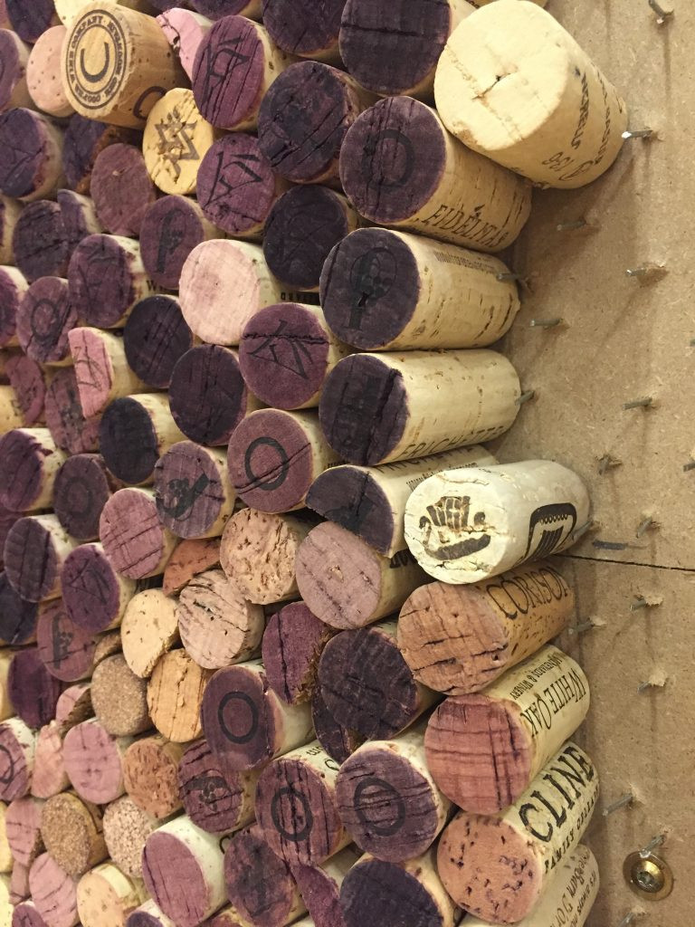 Tri-City area wineries donated recycled wine corks for the mural.