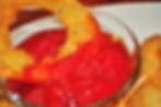 VIRGIN ONION RINGS WITH WARMED TOMATO CONCENTRATE FROM RED RIPE TOMATOES, DISTILLED VINEGAR, HIGH-FRUCTOSE CORN SYRUP, CORN SYRUP, SALT, SPICE AND ONION POWDER SAUCE