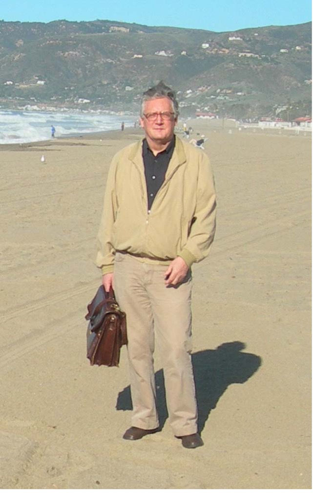 Morten on the beach with his heavy briefcase getting ready for the Gordon Research Conference on Pineal Cell Biology 2006.