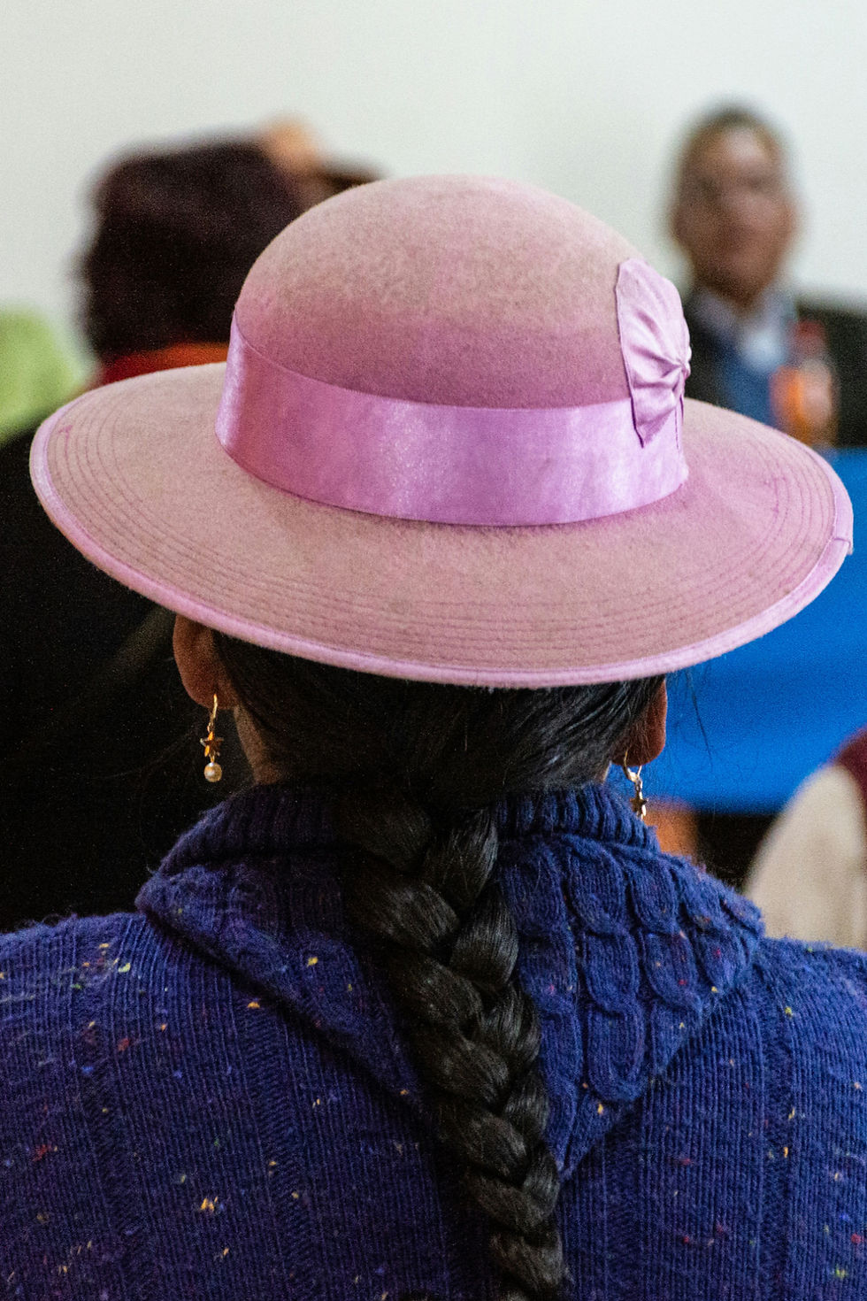 Peruvian lady with a pink traditional hat