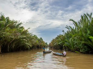 Two men in a boat on a river