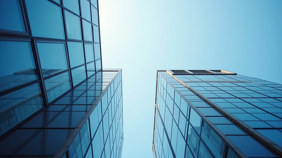 Eye-level view of a modern office building with a clear blue sky