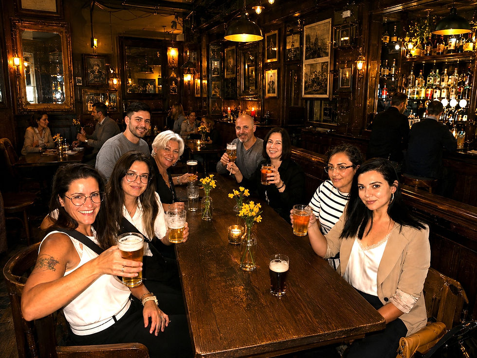 Group enjoying a relaxed pub stop during an Angel walking experience
