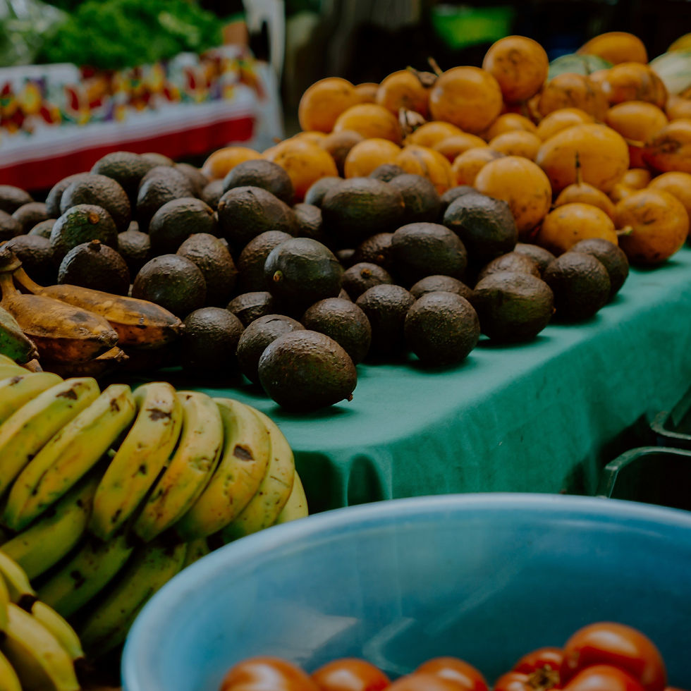 Fresh fruits are displayed at a vibrant outdoor market_edited