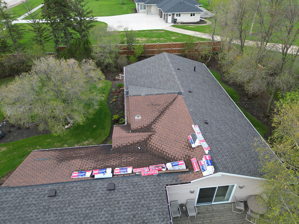 Roof shingles replacement half way done