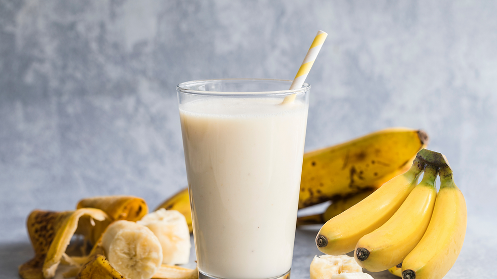 A refreshing glass of banana milk made with sweet and creamy baby bananas, perfect for a nourishing treat.